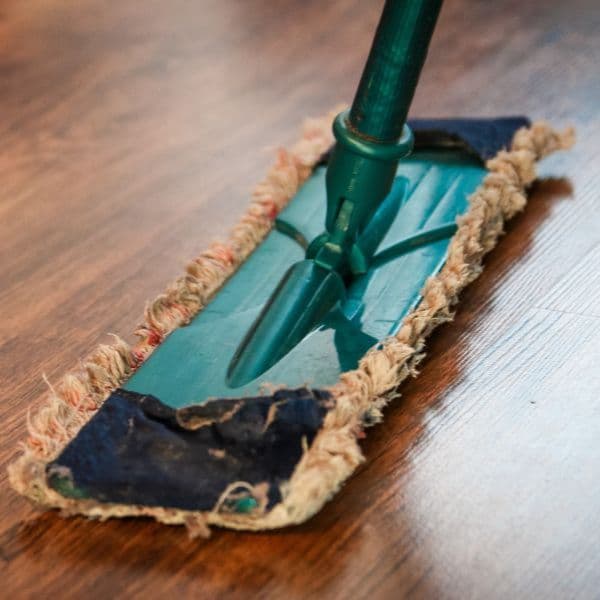 Mop cleaning a hardwood floor